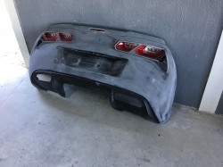 Complete bolt-on replacement bumper with C67 wing. - $1500